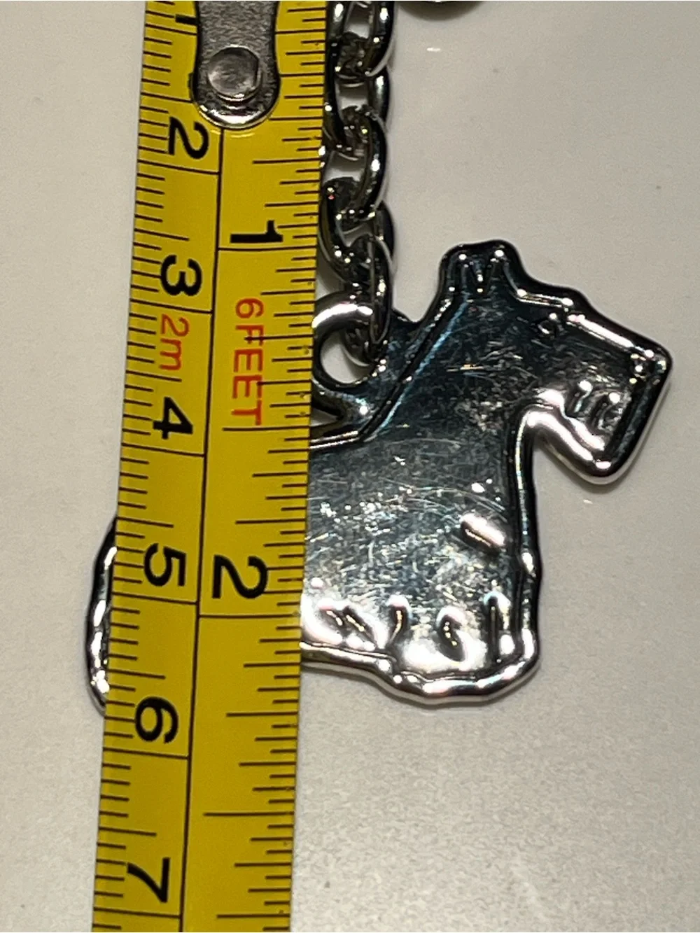 Great silver tone Scottish terrier dog keychain.  Approx 2.5” long.